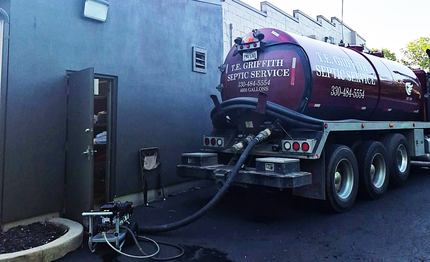 T.E. Griffith septic tank truck on-site.